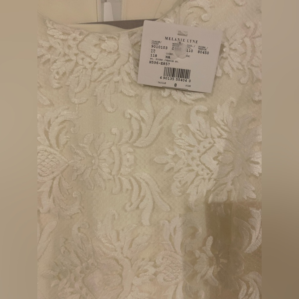 Brand new dalia white lace long sleeves dress from Melanie Lyne